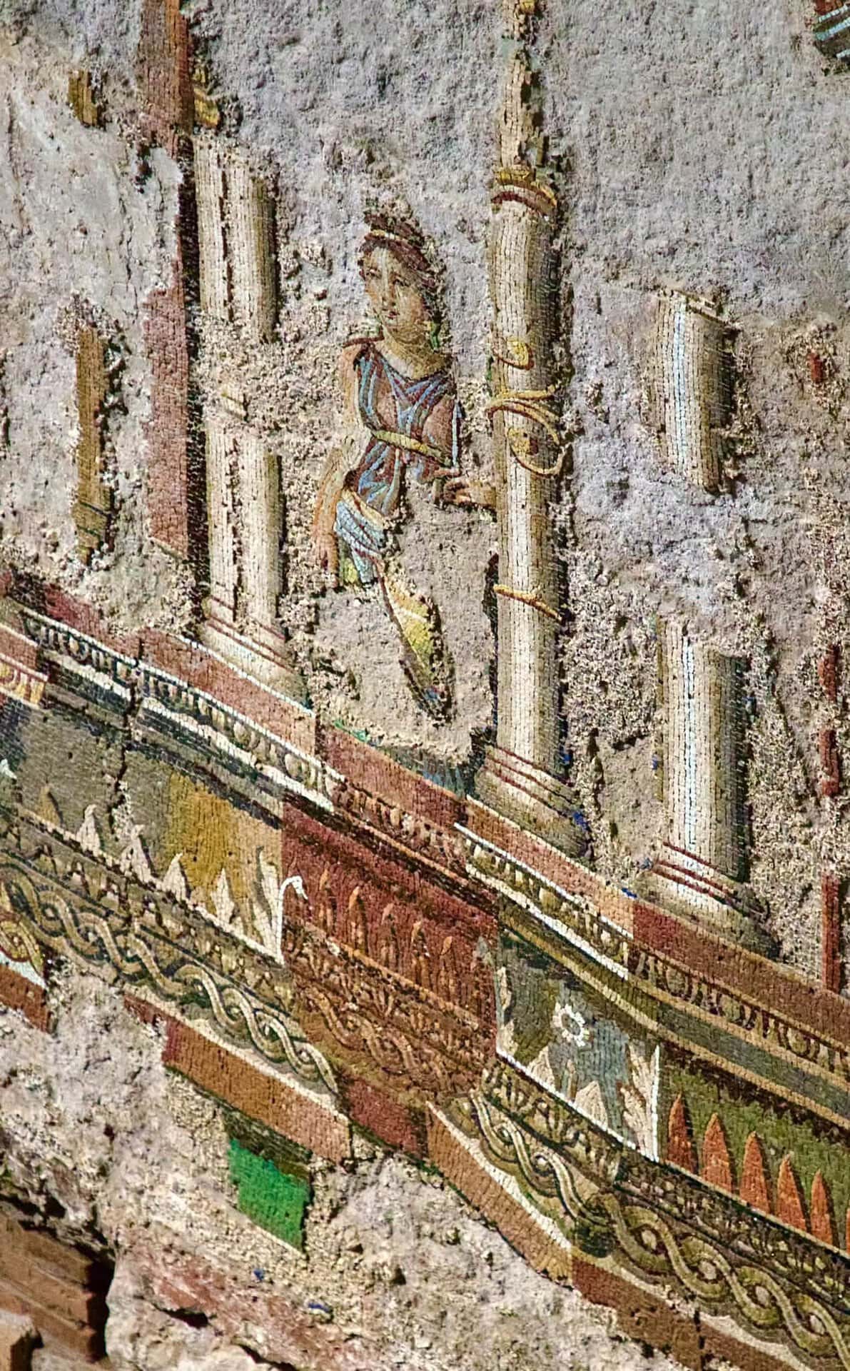 Mosaic figure among architectural decoration in the Baths of Trajan underground gallery