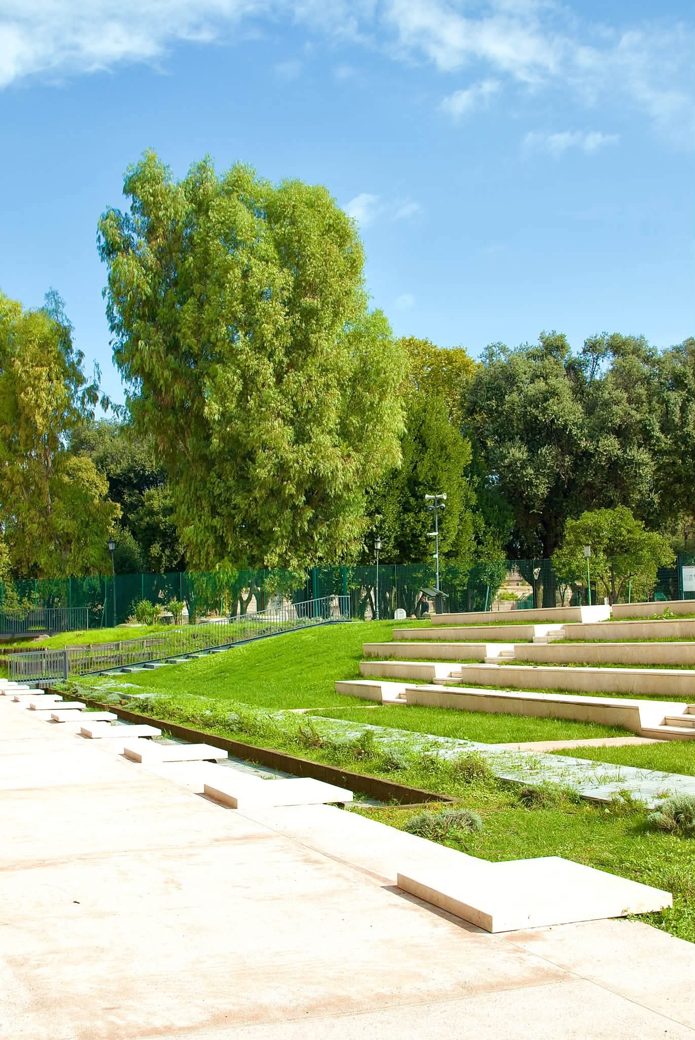 Stepped seating and landscaped grounds beside the Baths of Trajan