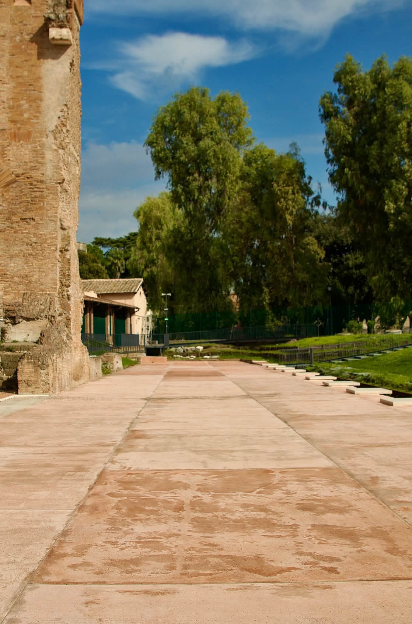 Brick tower and arched entrance at the Baths of Trajan on the Oppian Hill